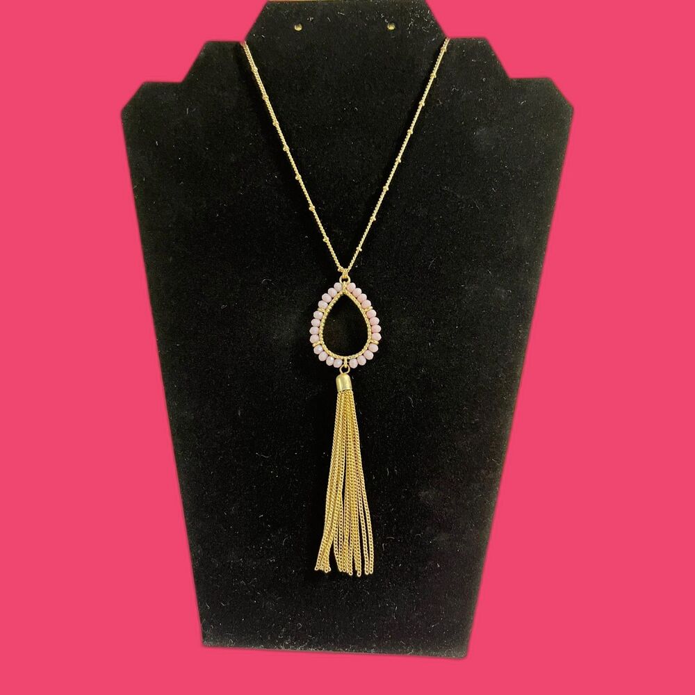 Gold Necklace With Pear Shaped Pink Stone Pendant And Gold Tassel